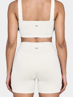 Woman wearing the Allure Short in Ivory by Gallenn – back detail