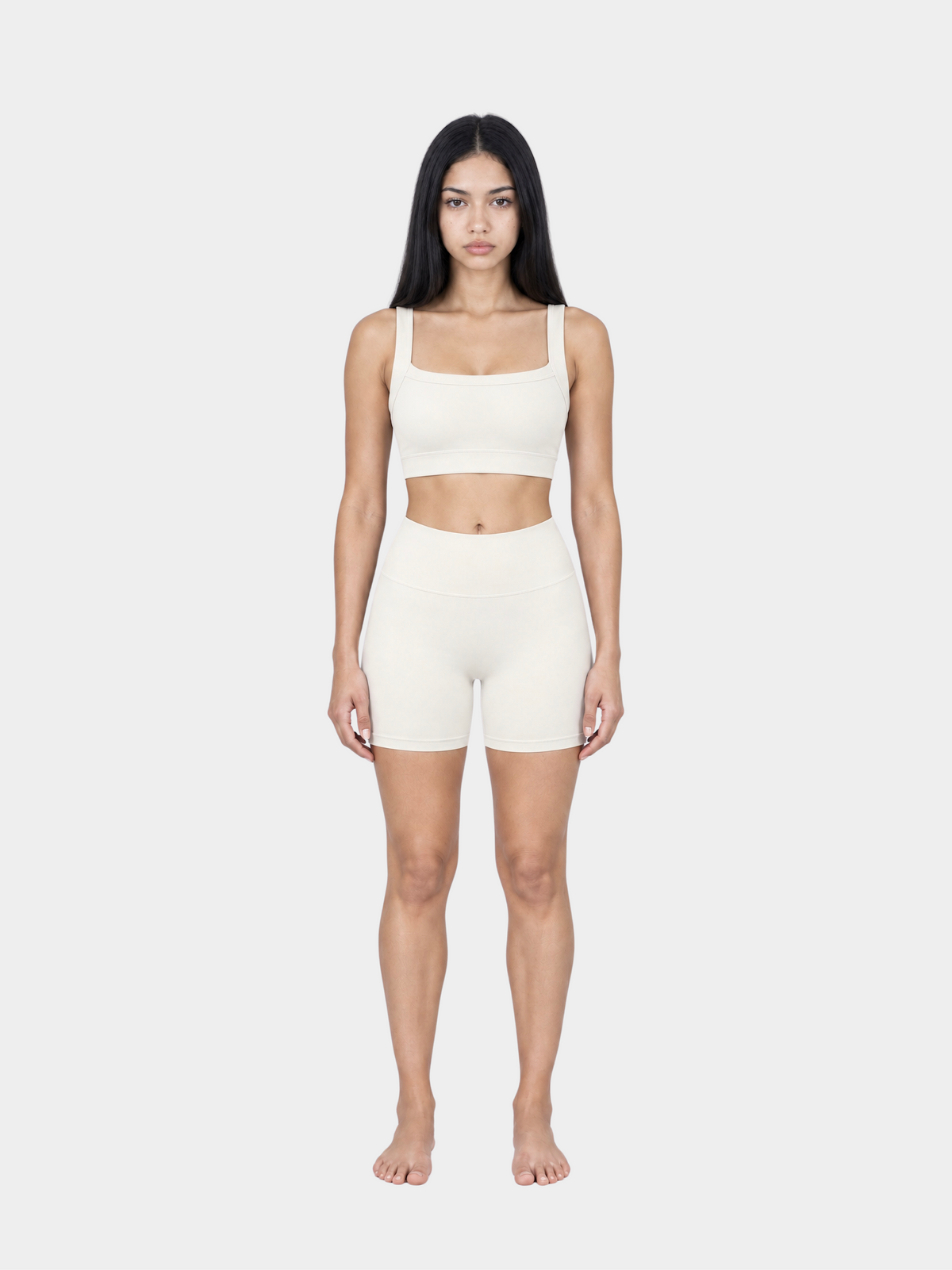 Woman wearing the Allure Short in Ivory by Gallenn – full front view