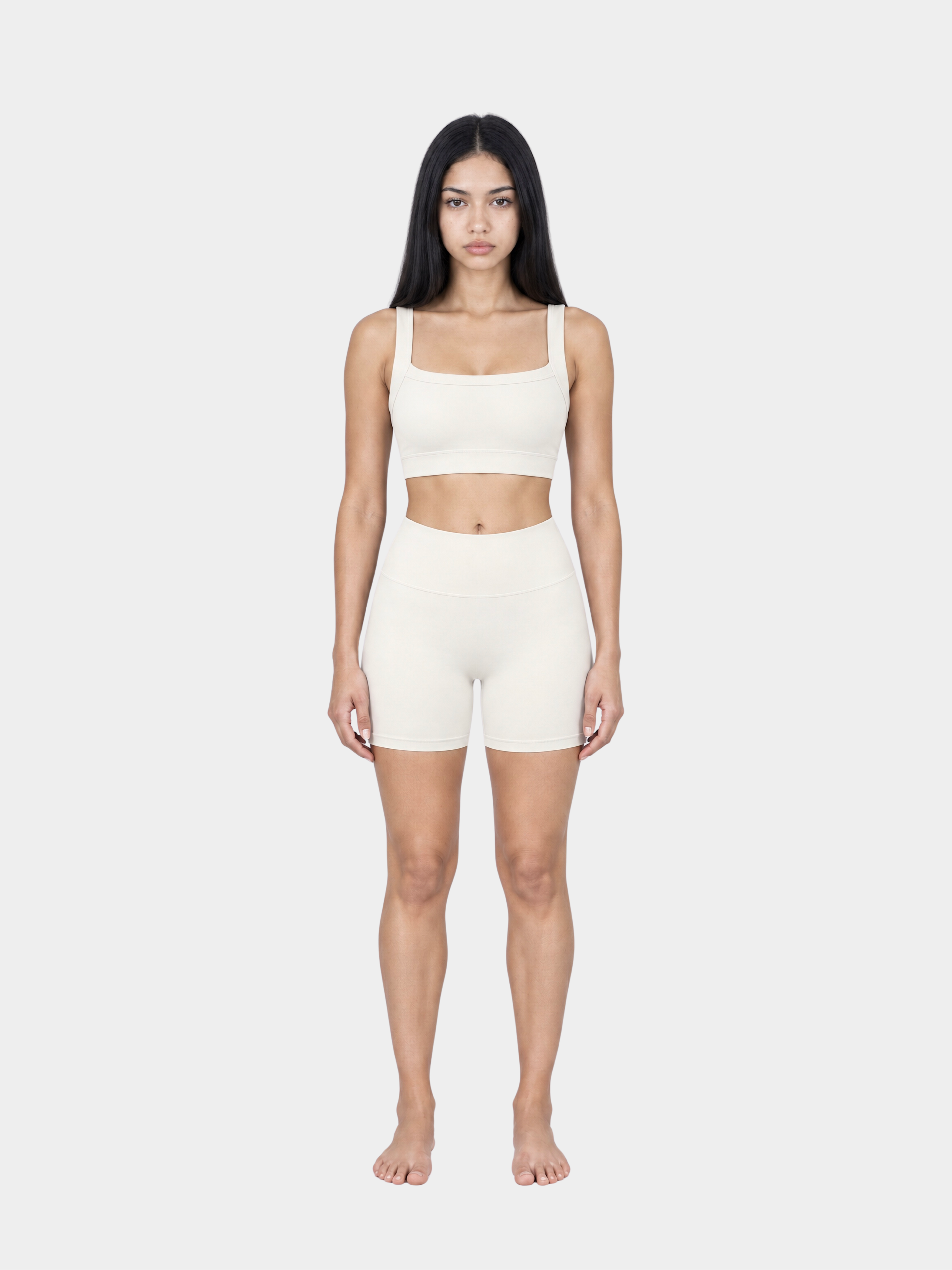 Woman wearing the Allure Short in Ivory by Gallenn – full front view