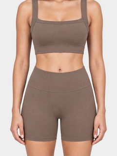 Woman wearing the Allure Short in Mocha by Gallenn – front detail