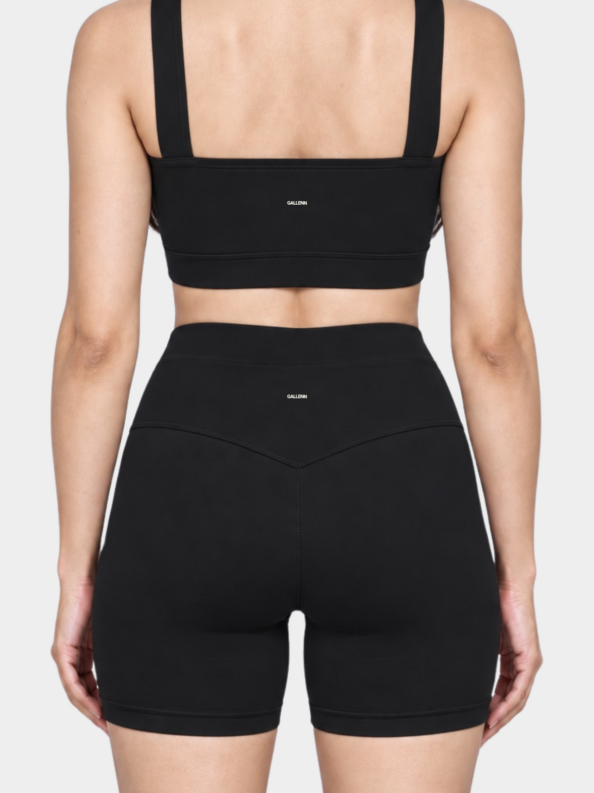 Woman wearing the Allure Short in Black by Gallenn – back detail