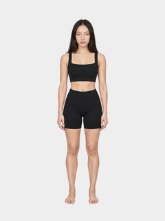 Woman wearing the Allure Short in Black by Gallenn – full front view