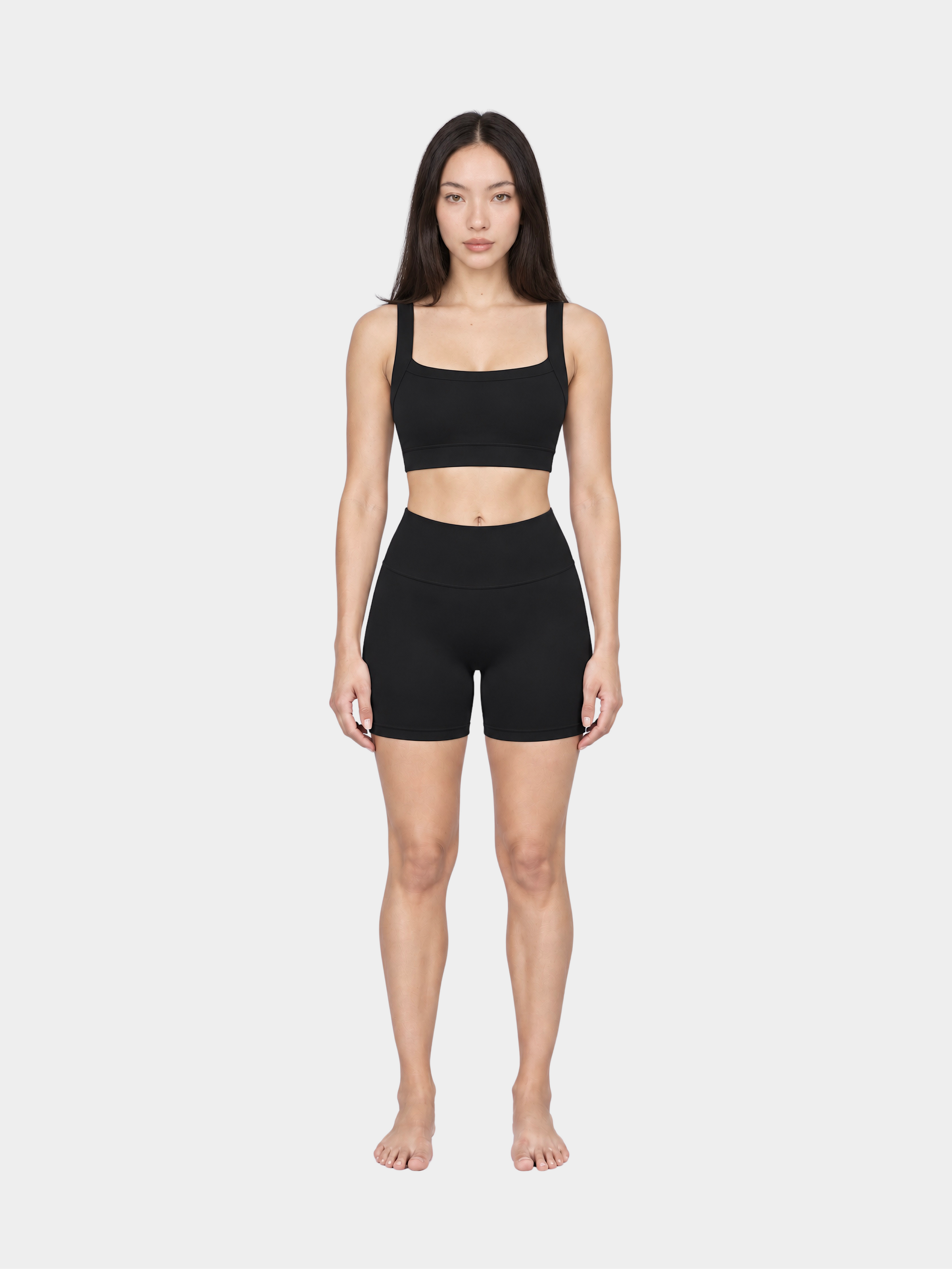 Woman wearing the Allure Short in Black by Gallenn – full front view