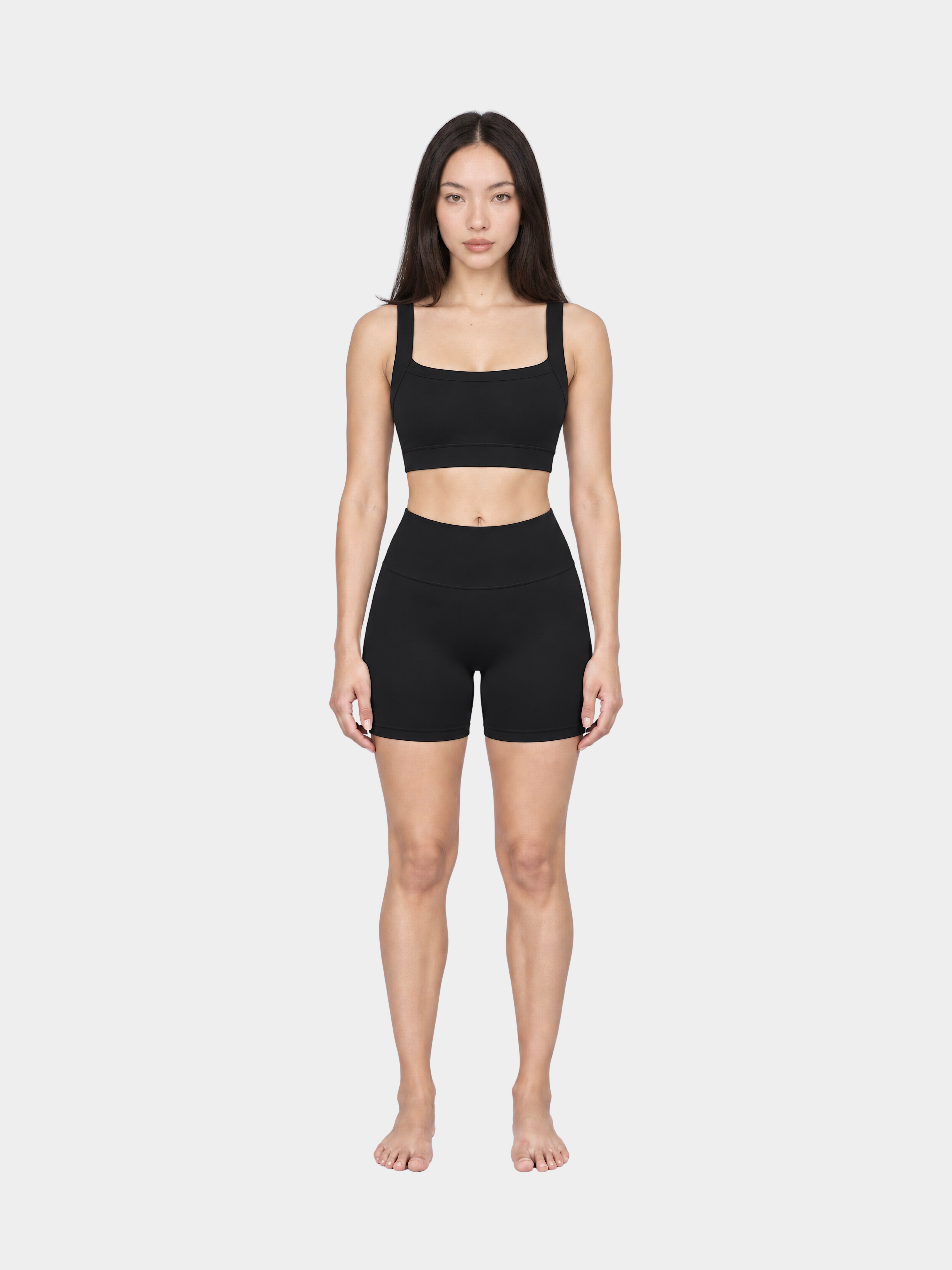 Woman wearing the Allure Short in Black by Gallenn – full front view
