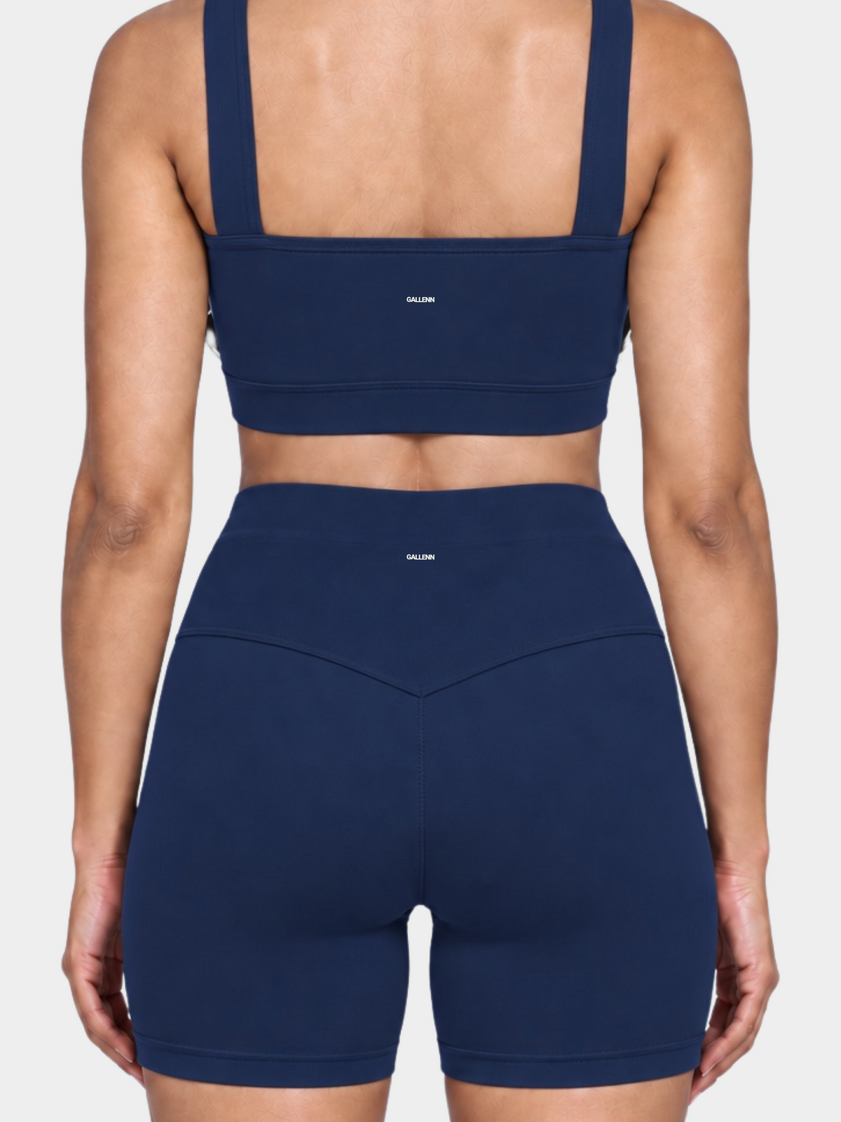 Woman wearing the Allure Short in Navy Blue by Gallenn – back detail
