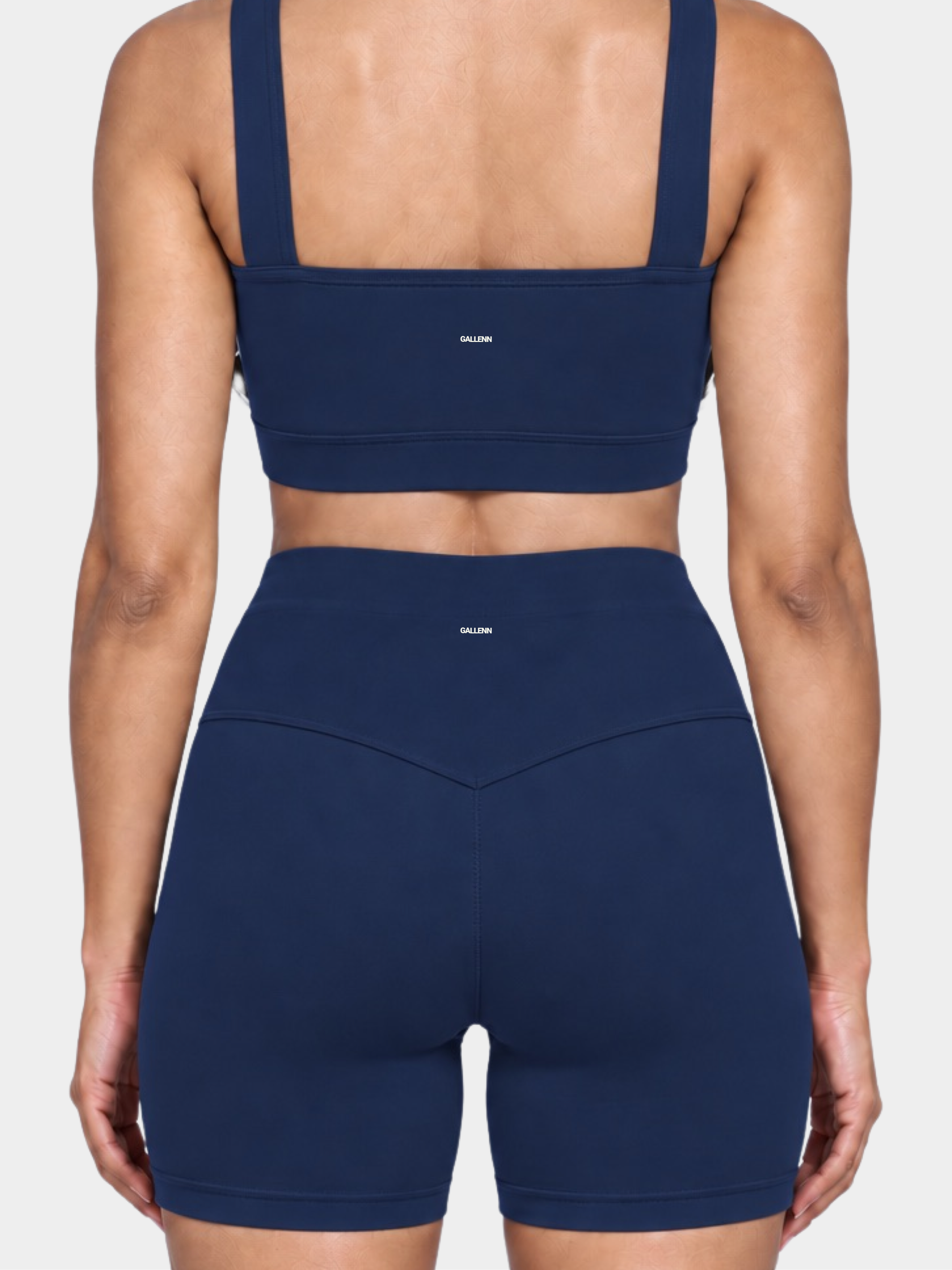 Woman wearing the Allure Short in Navy Blue by Gallenn – back detail