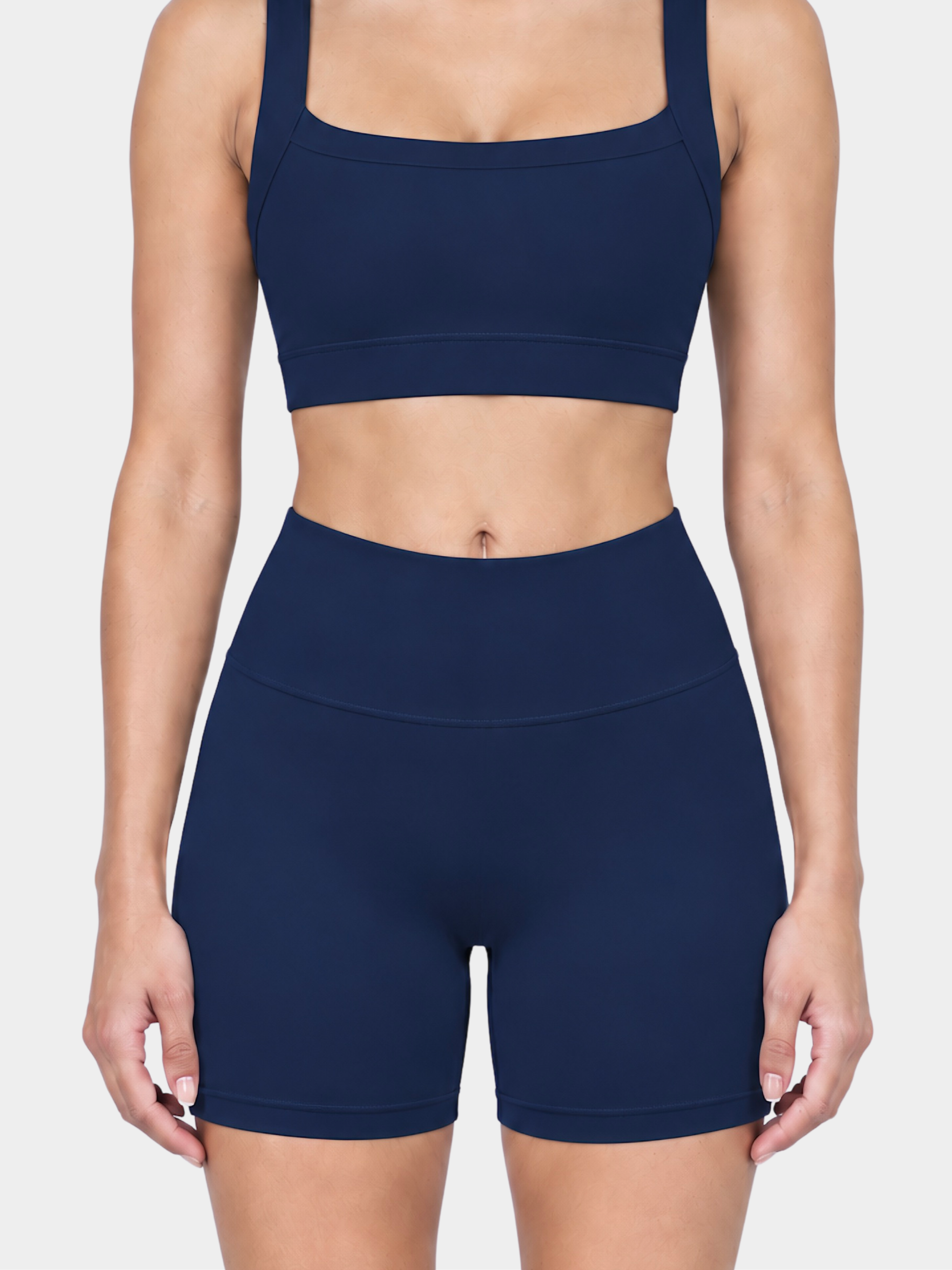Woman wearing the Allure Short in Navy Blue by Gallenn – front detail