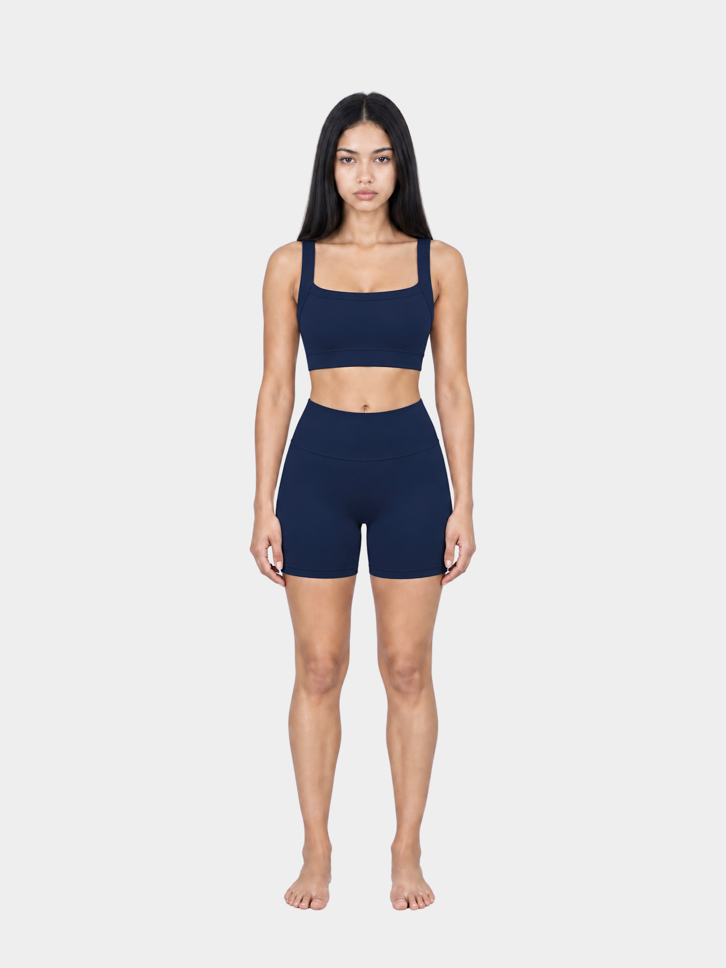 Woman wearing the Allure Short in Navy Blue by Gallenn – full front view
