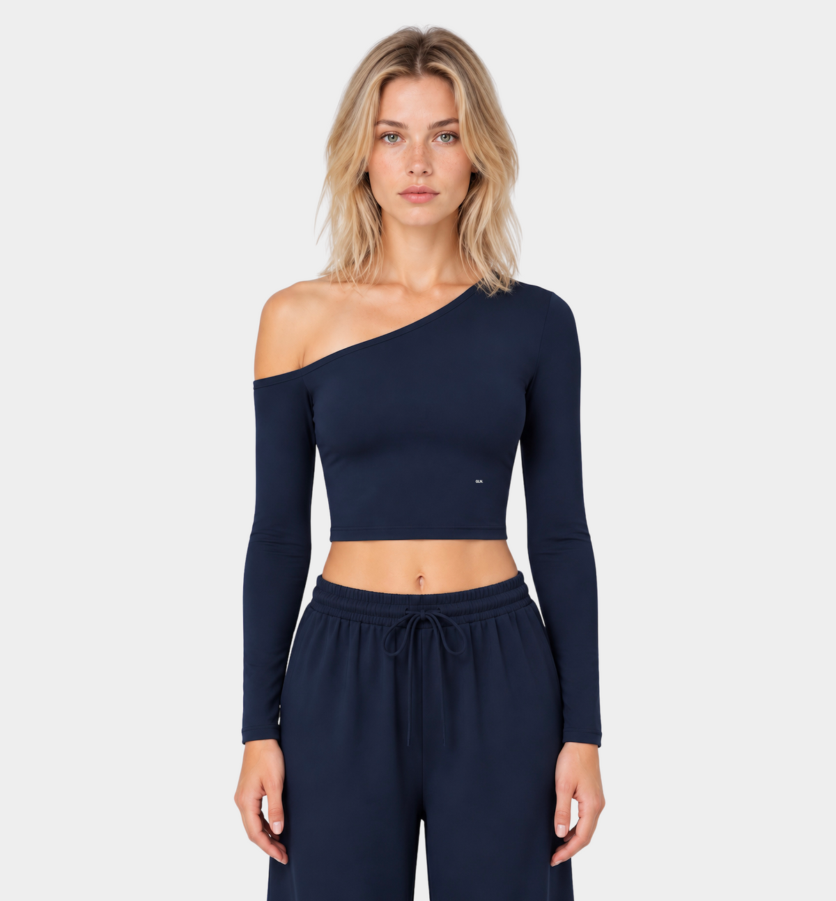 Woman wearing the Colette Top in Navy Blue with matching Colette Pants by Gallenn – front view