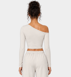 Woman wearing the Colette Top in Vanilla by Gallenn – back view