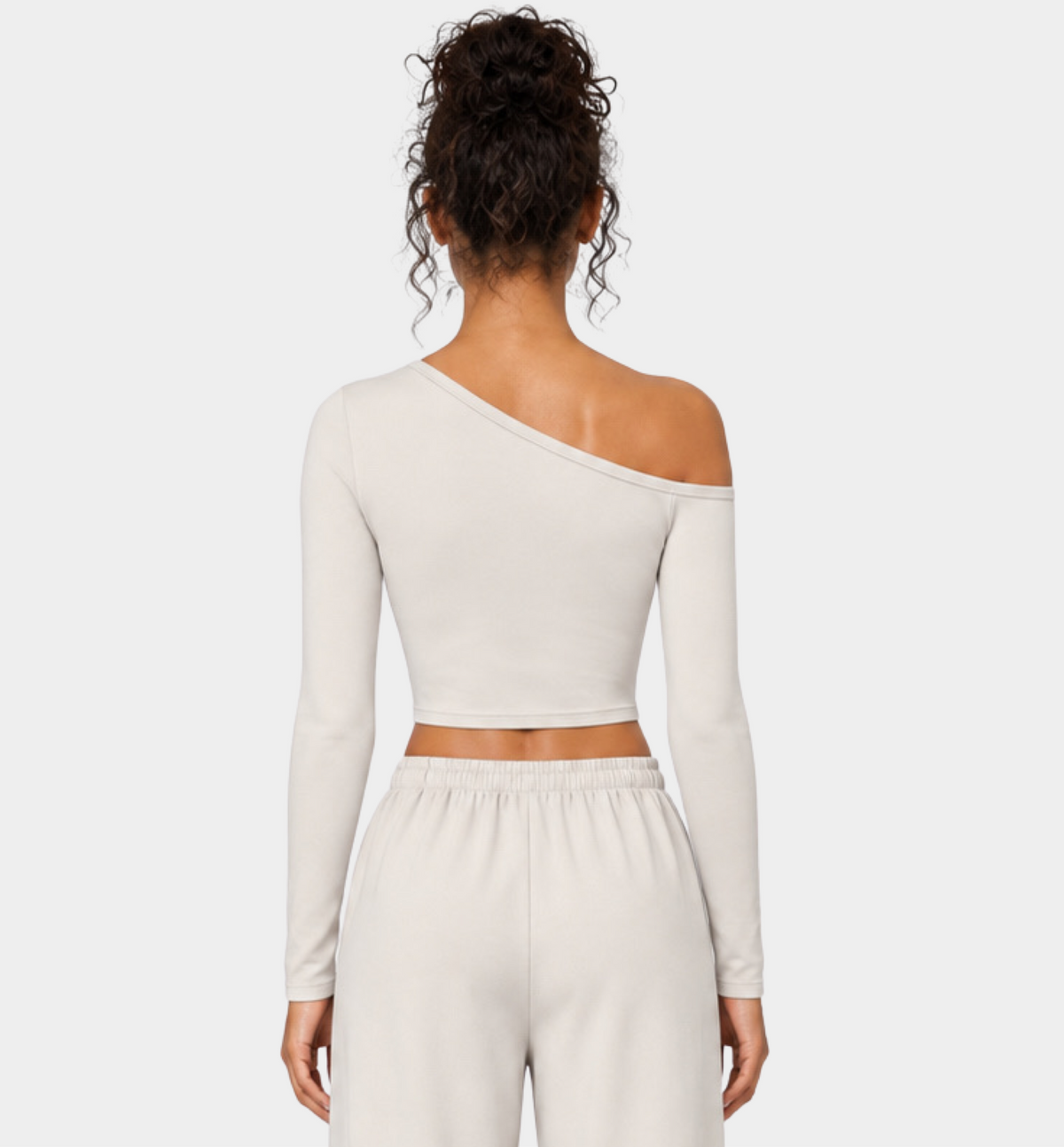 Woman wearing the Colette Top in Vanilla by Gallenn – back view