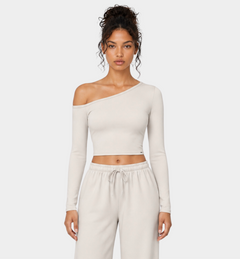 Woman wearing the Colette Top in Vanilla by Gallenn – front view
