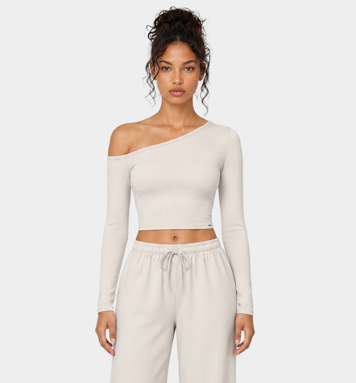 Woman wearing the Colette Top in Vanilla by Gallenn – front view
