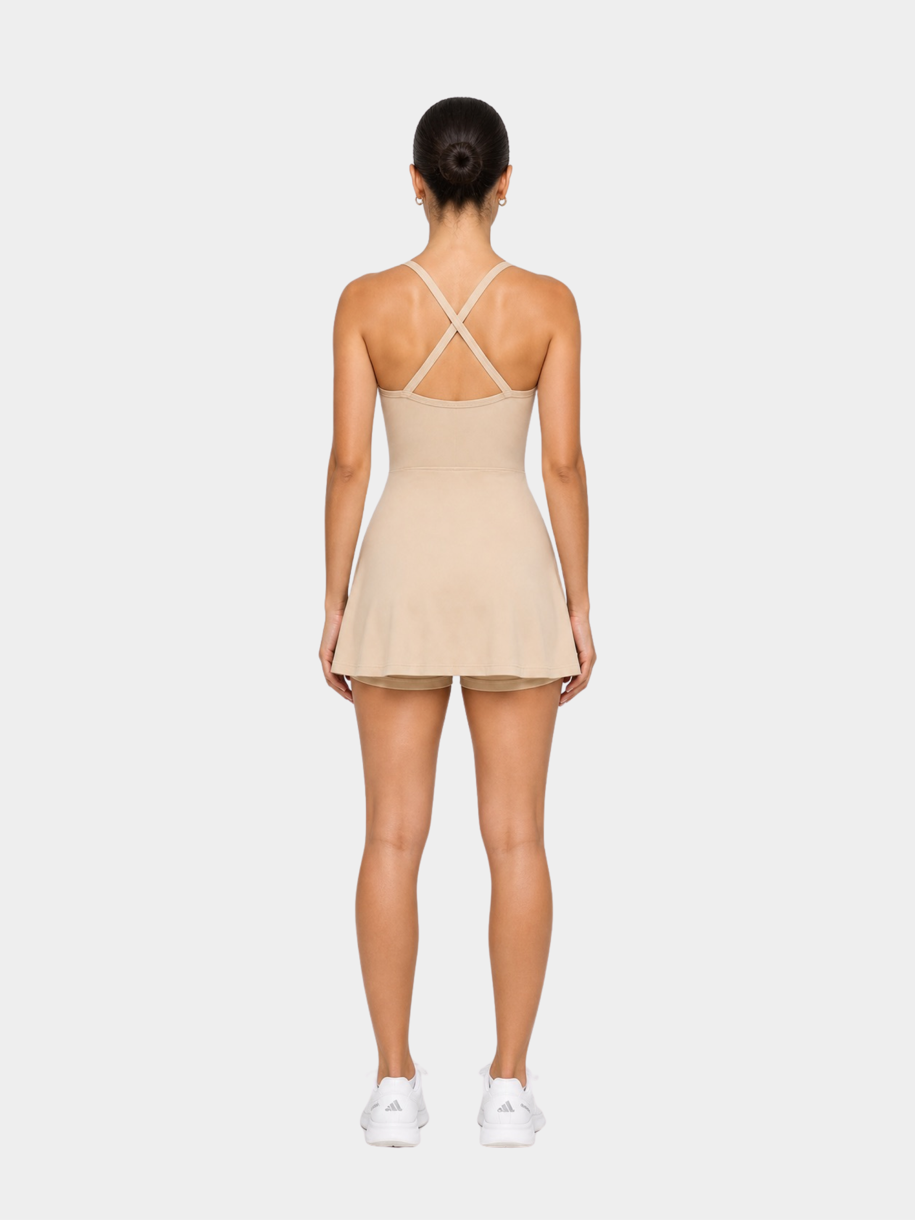 Rivoli Sand Beige tennis playsuit – model back view