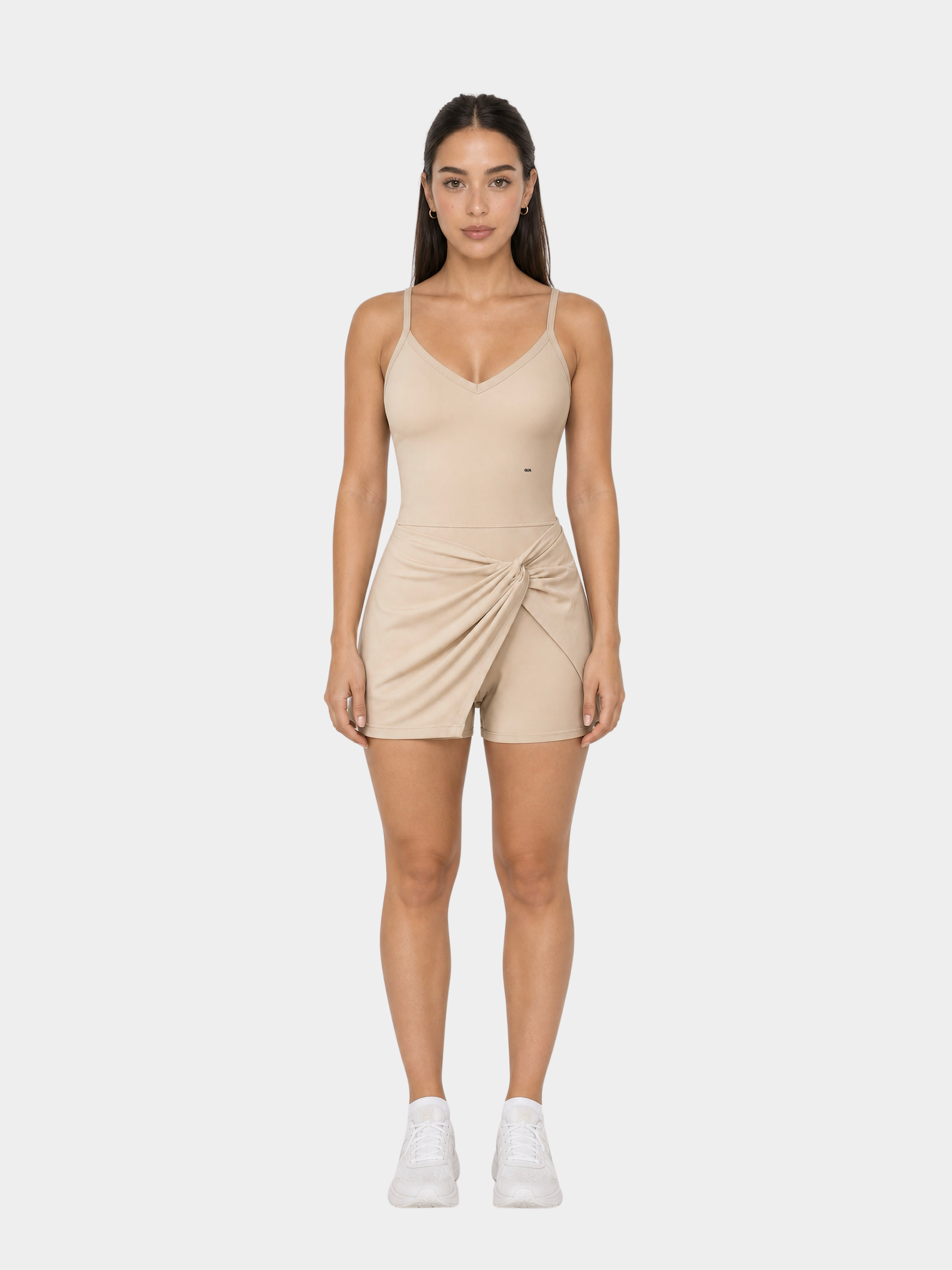 Rivoli Sand Beige tennis playsuit – model front view