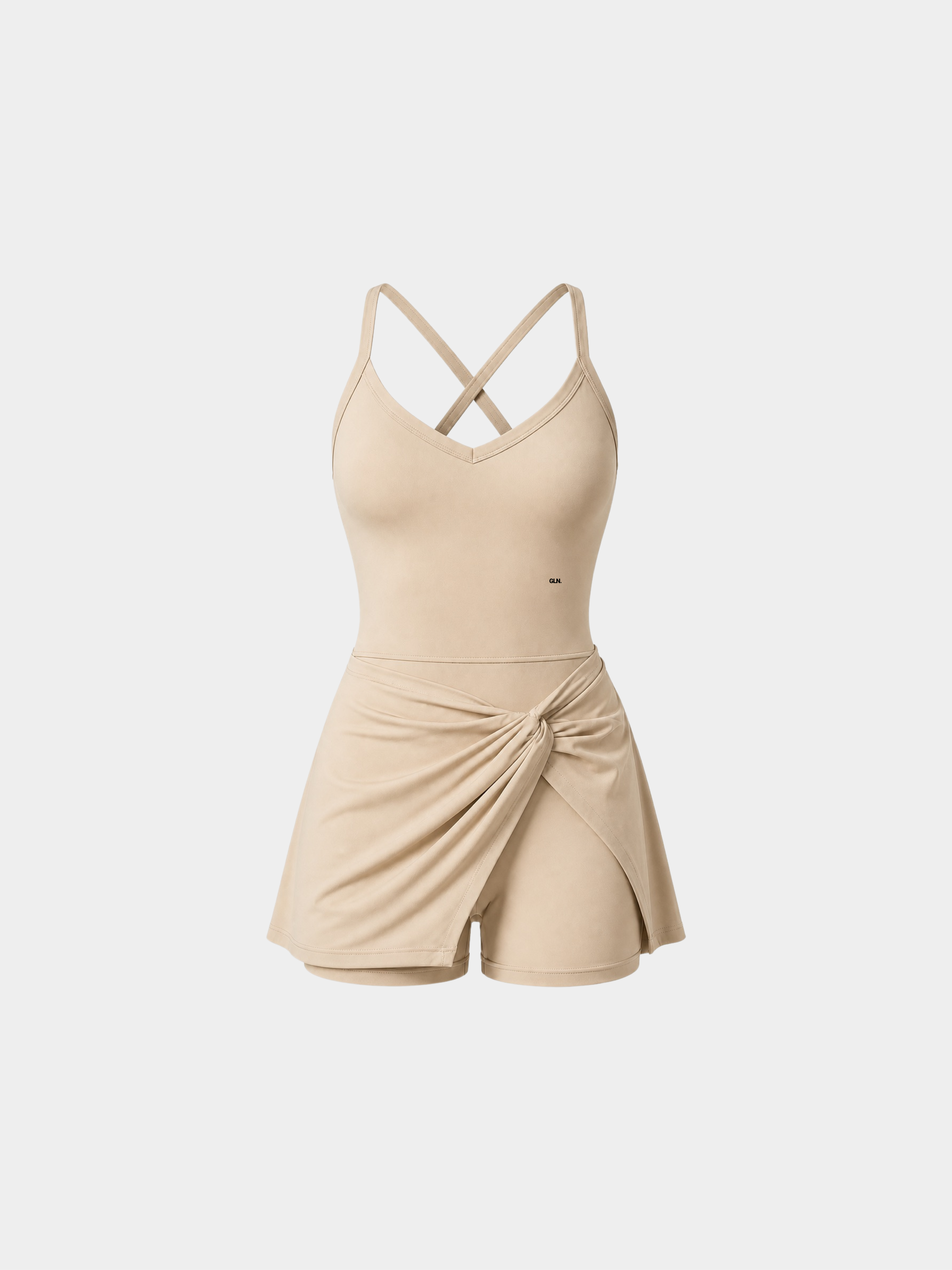 Rivoli Sand Beige tennis playsuit – ghost mannequin front view