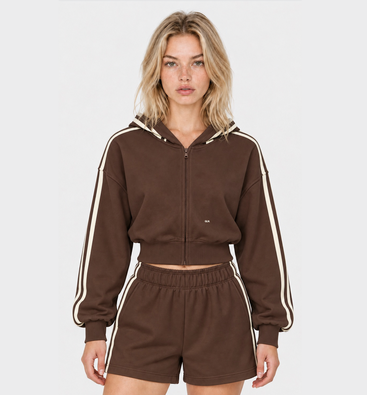 The Weekender Zip-Up Hoodie in Coffee by Gallenn – model front showing cream sleeve stripes