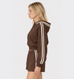 The Weekender Zip-Up Hoodie in Coffee by Gallenn – model side with cream contrast stripes