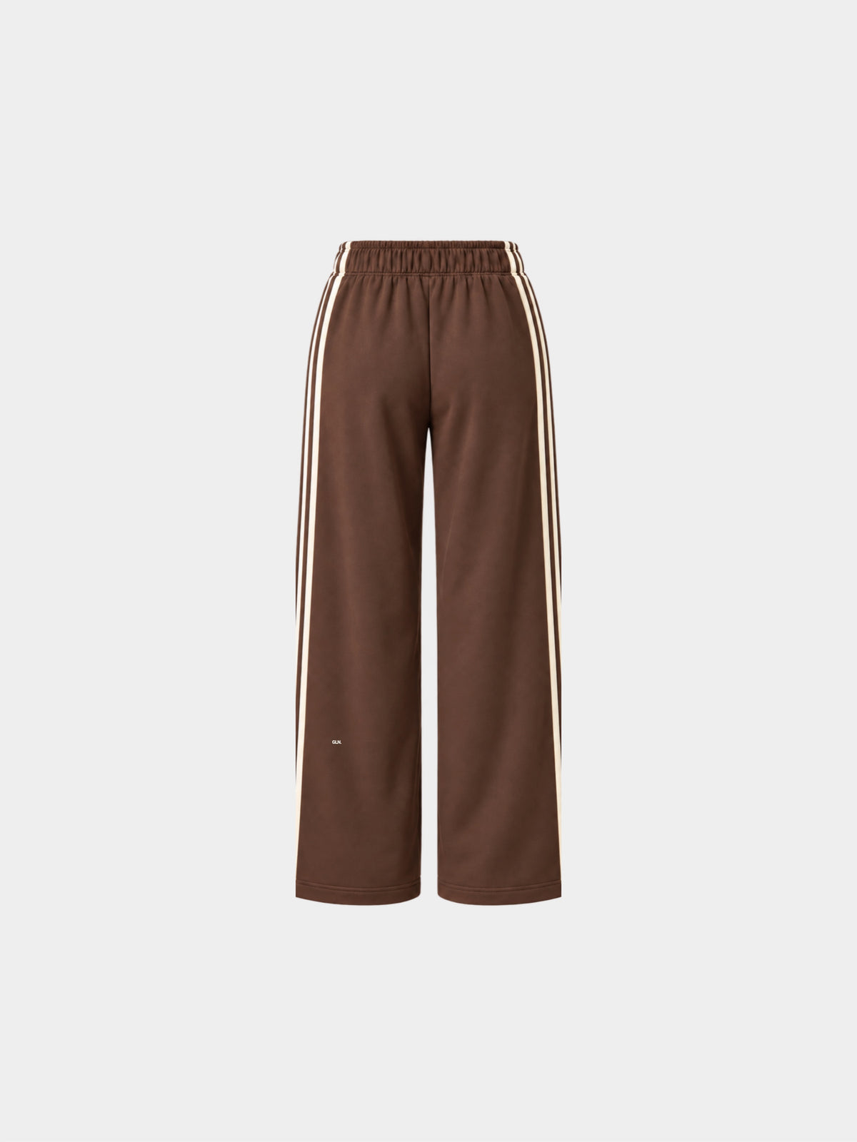The Weekender Pants in Coffee by Gallenn – product back view with wide legs and cream side stripes