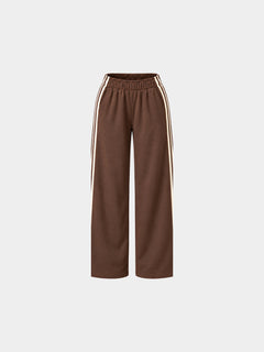 The Weekender Pants in Coffee by Gallenn – product front view with wide legs and cream side stripes