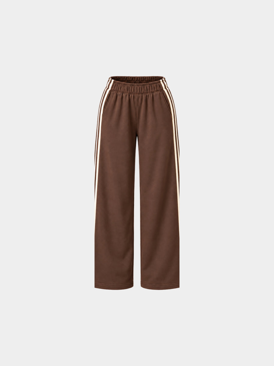 The Weekender Pants in Coffee by Gallenn – product front view with wide legs and cream side stripes