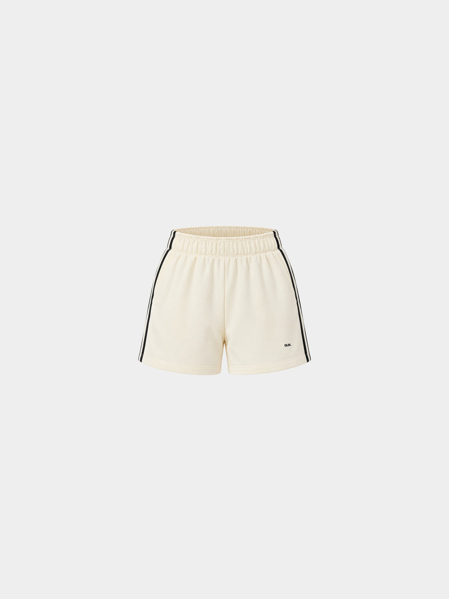 The Weekender Shorts in Beige by Gallenn – product front with black side stripes