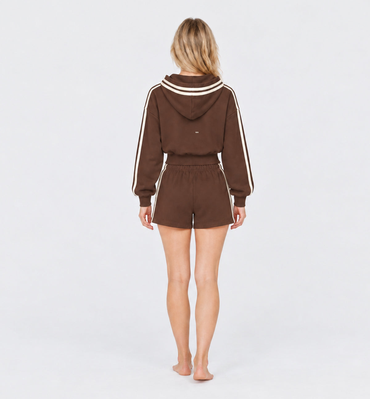The Weekender Shorts in Coffee by Gallenn – model back with cream side stripes