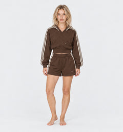 The Weekender Shorts in Coffee by Gallenn – model front with cream side stripes